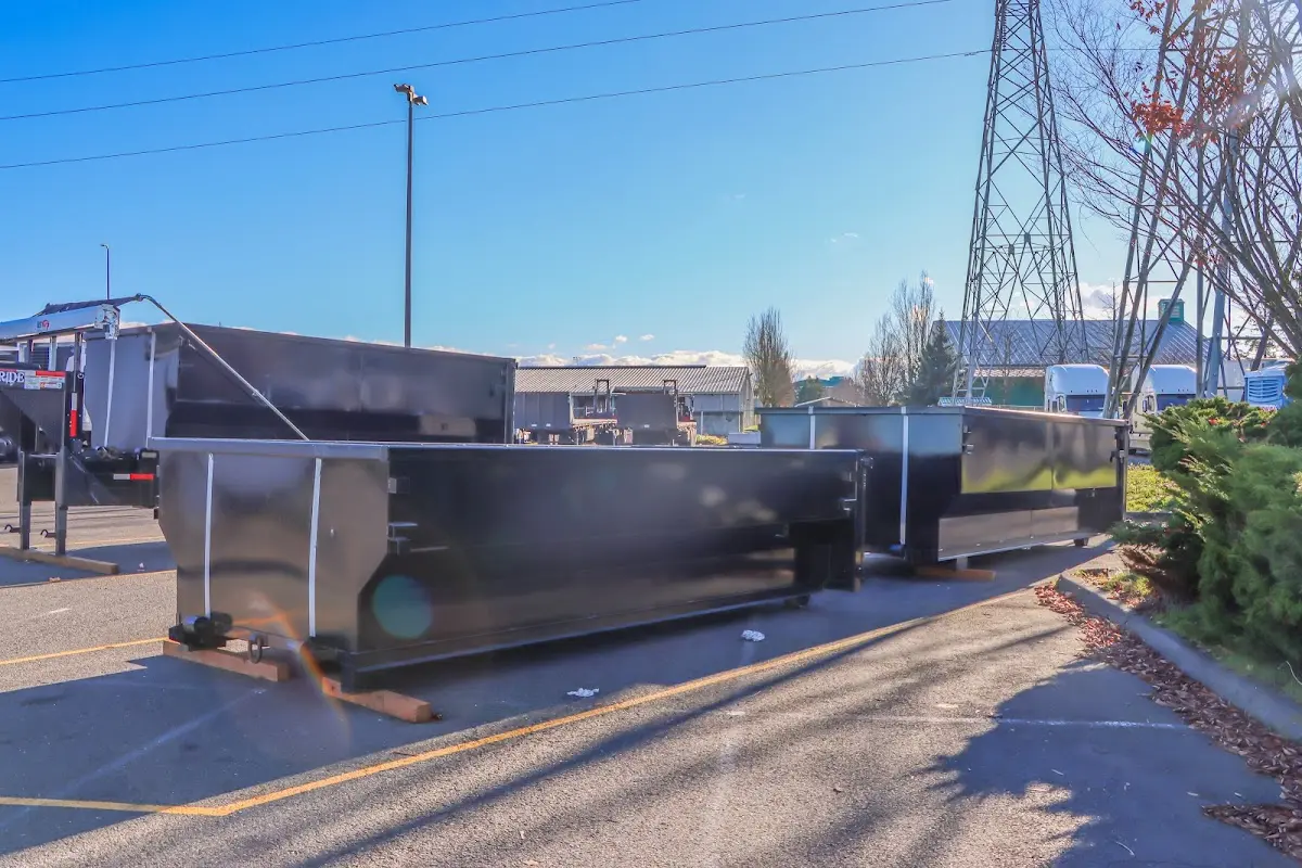 Roll-off dumpster ready for waste disposal at job site for Roofing Dumpster Rental in Firebaugh